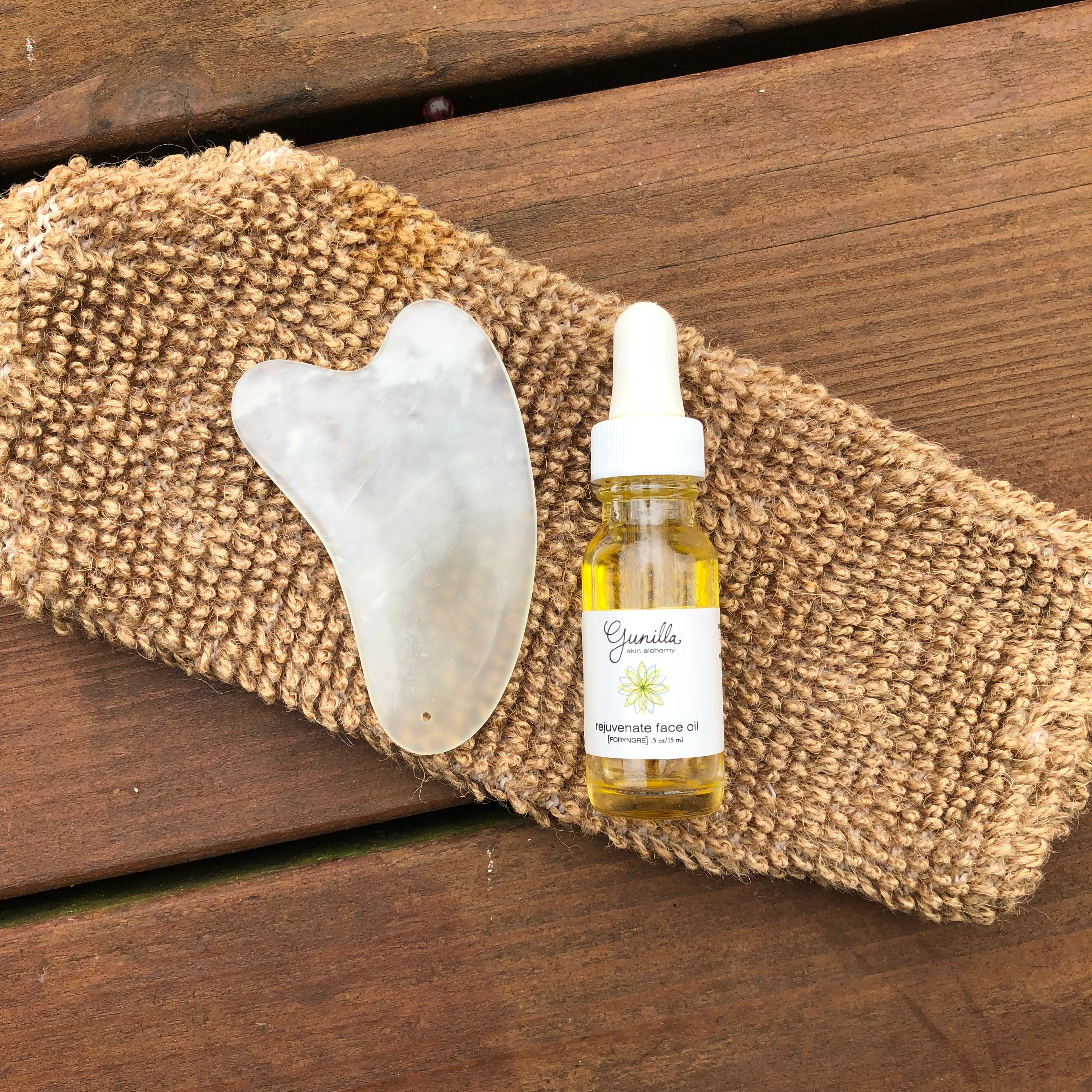 how to improve your skin with my easy to follow gua sha face tool and Gunilla Skin Alchemy Rejuvenate Face Oil.