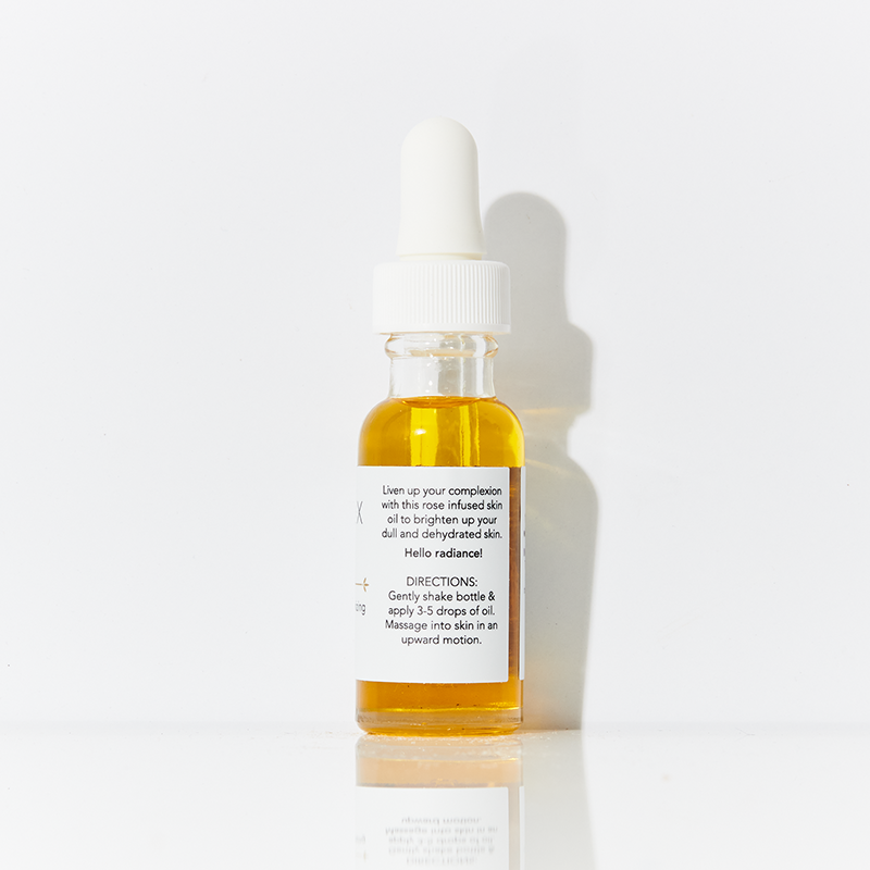 Skincare serum bottle with dropper on a white background