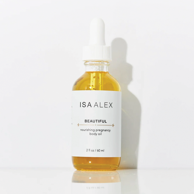 Bottle of Isa Alex Beautiful body oil on a white background